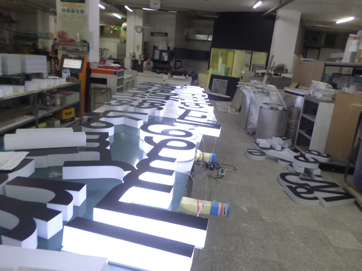 Channel letters lined up in the workshop