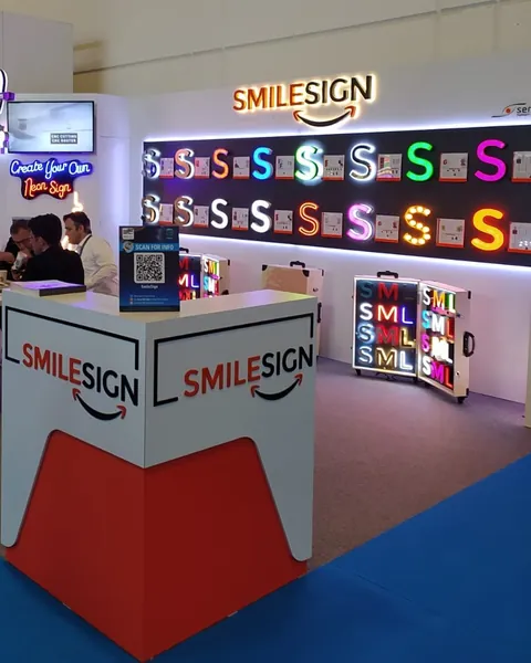 SmileSign stand at FESPA Global Print Expo 2022 in Berlin with the SmileSign counter and illuminated letter samples