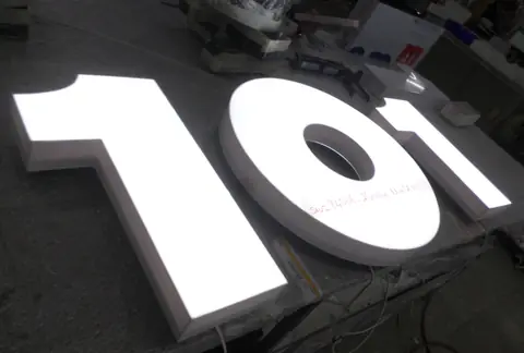 Illuminated channel letters in production