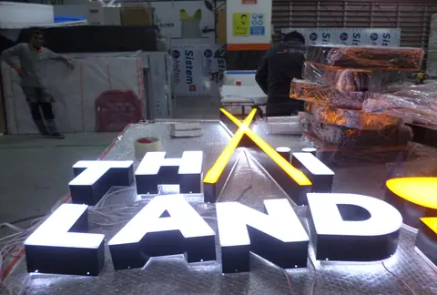 Illuminated channel letters in production