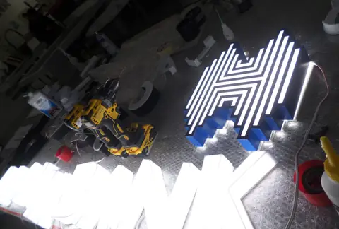 Illuminated channel letters in production