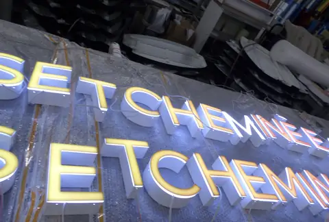 Illuminated channel letters in production