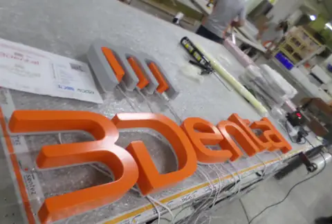 Illuminated channel letters in production