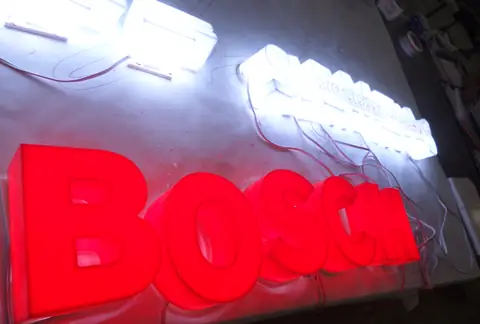 Illuminated channel letters in production