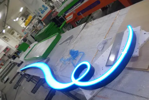Illuminated channel letters in production