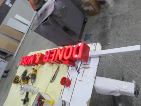Illuminated channel letters in production