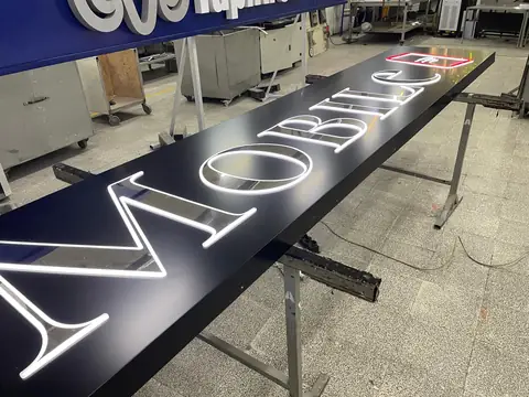 Illuminated channel letters in production